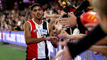 MELBOURNE, AUSTRALIA - MARCH 29: Nasiah Wanganeen-Milera of the Saints enjoys the win with fans during the round three AFL match between St Kilda Saints and Richmond Tigers at Marvel Stadium, on March 29, 2025, in Melbourne, Australia. (Photo by Jonathan DiMaggio/Getty Images)