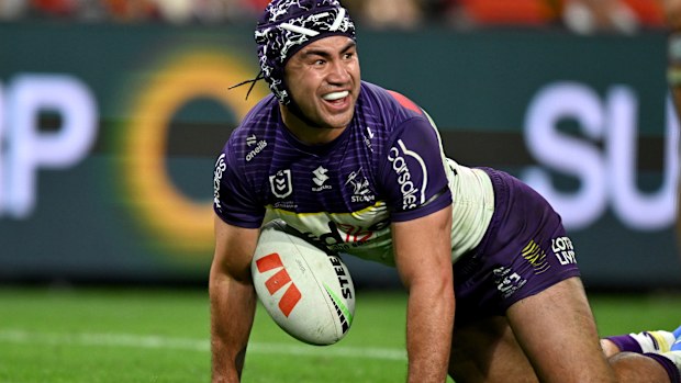 Jahrome Hughes celebrating after scoring a try for the Melbourne Storm against the Brisbane Broncos in round 27.
