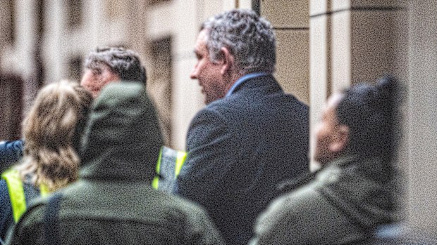Greg Lynn is led away from court after being jailed for 32 years.