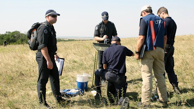Dutch, Malaysian and Australian investigators at the MH17 crash site have called on local villagers to help them.