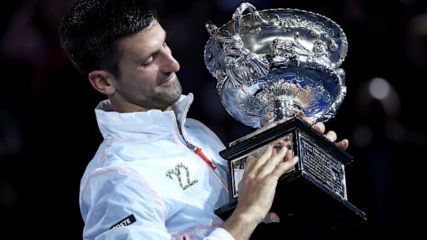 Novak Djokovic of Serbia poses with the Norman Brookes Challenge Cup after winning the Men's Singles Final match against Stefanos Tsitsipas of Greece during day 14 of the 2023 Australian Open at Melbourne Park on January 29, 2023 in Melbourne, Australia. (Photo by Cameron Spencer/Getty Images)