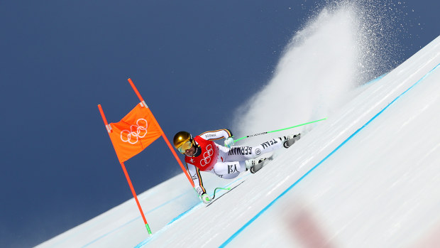 Dominik Schwaiger skis during the men's downhill.