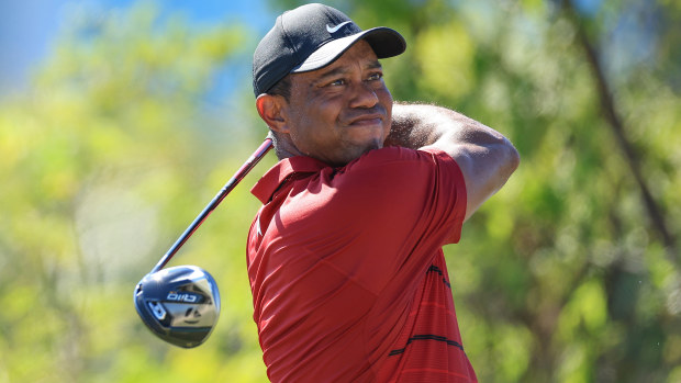 Tiger Woods plays his tee shot on the third hole during the final round of the Hero World Challenge.