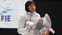 Ibtihaj Muhammad, the first female to compete at the Olympics wearing a hijab while competing in the fencing. (Photo by Devin Manky/Getty Images)