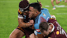 SYDNEY, AUSTRALIA - MAY 27: Tolutau Koula of the Blues is tackled by Kalyn Ponga of the Maroons during game one of the 2026 Men's State of Origin series between New South Wales Blues and Queensland Maroons at Accor Stadium on May 27, 2026 in Sydney, Australia. (Photo by Darrian Traynor/Getty Images)