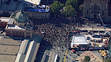 Scores of protesters swarmed the steps of Flinders Street Station.