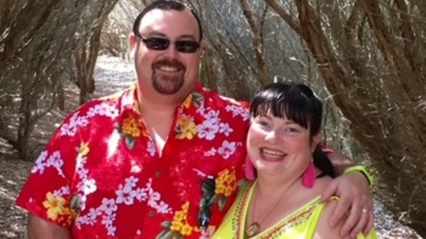 Dyan Henry with her husband and their child.