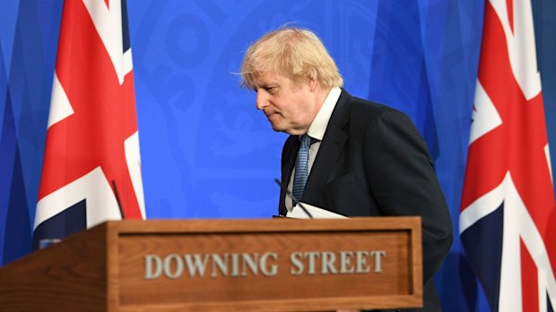 Britain's Prime Minister Boris Johnson leaves, after a coronavirus briefing in Downing Street, London