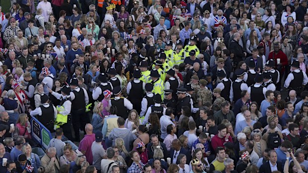Crowds gather for the concert at Windsor Castle in Windsor, England, Sunday, May 7, 2023, celebrating the coronation of King Charles III. It is one of several events over a three-day weekend of celebrations. (Jonathan Brady/Pool Photo via AP)