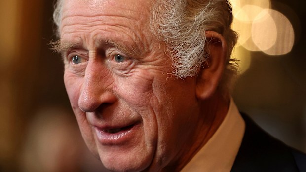 King Charles III speaks with guests during a reception and ceremony commemorating the 50th anniversary of the Resettlement of British Asians from Uganda in the UK, at Buckingham Palace in London, Wednesday Nov. 2, 2022 