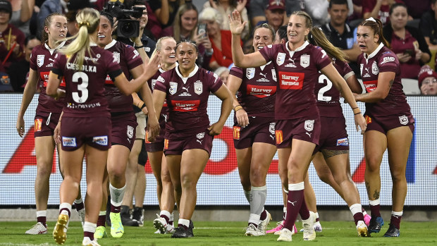 TOWNSVILLE, AUSTRALIA - JUNE 22: Queensland celebrates the try of Tarryn Aiken of the Maroons during game two of the women's state of origin series between New South Wales Skyblues and Queensland Maroons at Queensland Country Bank Stadium on June 22, 2023 in Townsville, Australia. (Photo by Ian Hitchcock/Getty Images)