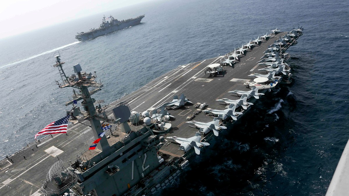 Threats, tension as massive US warship arrives in Middle East | Nine.com.au
