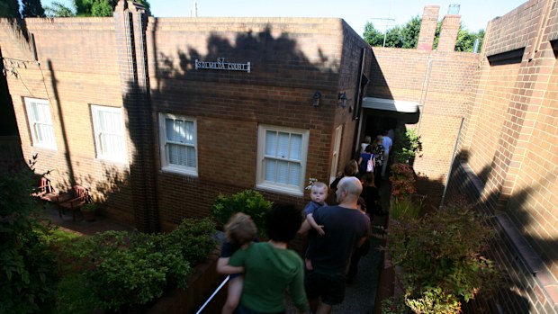 People inspect rental properties.