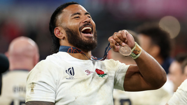 Manu Tuilagi of England shows appreciation to the fans after receiving his bronze medal.