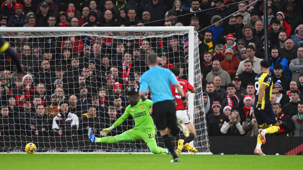 Dominic Solanke of AFC Bournemouth scores their team's first goal during the Premier League match between Manchester United and AFC Bournemouth at Old Trafford on December 09, 2023 in Manchester, England. (Photo by Stu Forster/Getty Images)