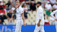 Ben Stokes leaves the field after suffering an injury.