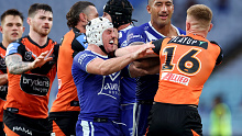 SYDNEY, AUSTRALIA - MAY 04: Reed Mahoney of the Bulldogs clashes with Alex Seyfarth of the Tigers during the round nine NRL match between Canterbury Bulldogs and Wests Tigers at Accor Stadium, on May 04, 2024, in Sydney, Australia. (Photo by Brendon Thorne/Getty Images)