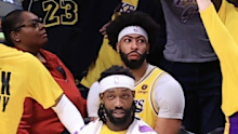 Anthony Davis cut a solemn figure as his teammate made history.
