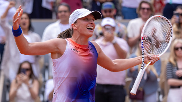 Iga Swiatek of Poland celebrates winning match point against Jasmine Paolini of Italy during the Women's Singles Final match on Day 14 of the 2024 French Open at Roland Garros on June 08, 2024 in Paris, France. (Photo by Tnani Badreddine/DeFodi Images via Getty Images)