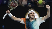 Stefanos Tsitsipas of Greece celebrates after defeating Jannik Sinner of Italy in their quarterfinal match at the Australian Open tennis championships in Melbourne, Australia, Wednesday, Jan. 26, 2022. (AP Photo/Hamish Blair)
