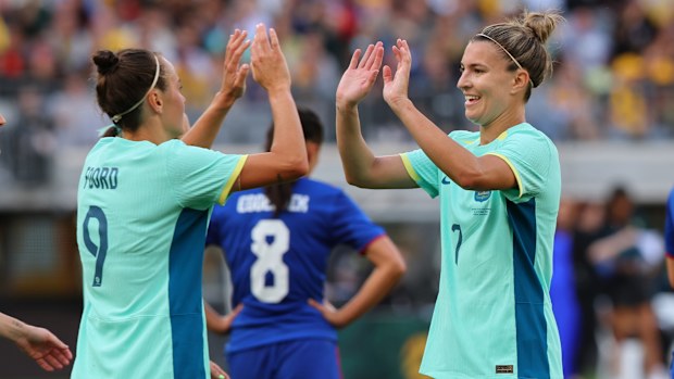 PERTH, AUSTRALIA - OCTOBER 29: Steph Catley of the Matildas and Caitlin Foord of the Matildas celebrates a goal during the AFC Women's Asian Olympic Qualifier match between Philippines and Australia Matildas at Optus Stadium on October 29, 2023 in Perth, Australia. (Photo by James Worsfold/Getty Images)