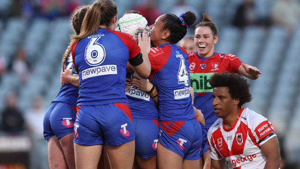 Makenzie Weale of the Knights celebrates a try against the Dragons.