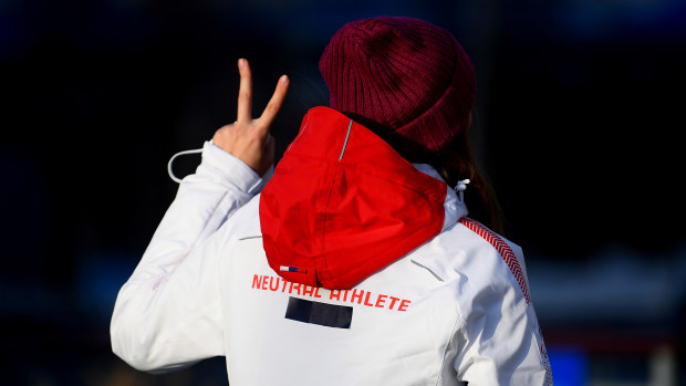An athlete in a 'Neutral Athlete' jacket at the 2022 Beijing Winter Olympics.
