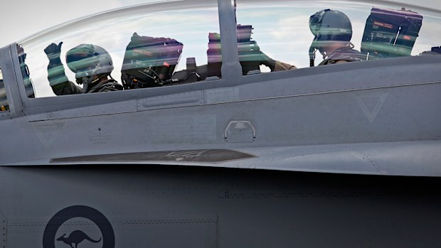 Crew of a F/A-18 Hornet prepare to take off. (ADF) 