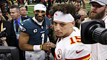 Jalen Hurts shakes hands with Patrick Mahomes. 