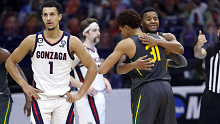 INDIANAPOLIS, INDIANA - APRIL 05: MaCio Teague #31 hugs Jared Butler #12 of the Baylor Bears during the National Championship game of the 2021 NCAA Men's Basketball Tournament against the Gonzaga Bulldogs at Lucas Oil Stadium on April 05, 2021 in Indianapolis, Indiana. (Photo by Jamie Squire/Getty Images)