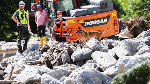 Cleanup work is underway at the Sorte village, community of Lostallo, Southern Switzerland, after a landslide, caused by the bad weather and heavy rain in the Misox valley, in Lostallo, Southern Switzerland, Saturday, June 22 2024. Massive thunderstorms and rainfall led to a flooding situation on Friday evening after a landslide in the Misox valley. Four people went missing on Saturday morning. Several dozen people had to be evacuated from their homes in the Misox and Calanca regions.