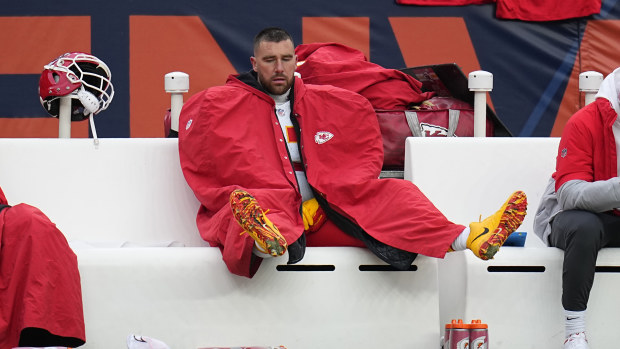 Kansas City Chiefs tight end Travis Kelce sits on the bench during the second half of an NFL football game against the Denver Broncos Sunday, Oct. 29, 2023, in Denver. (AP Photo/Jack Dempsey)