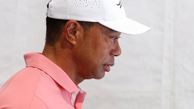 Tiger Woods walks out of the media center after speaking to the media at a press conference prior to the Hero World Challenge 2024 at Albany Golf Course on December 03, 2024 in Nassau, Bahamas. (Photo by Kevin C. Cox/Getty Images)