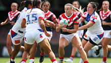 The Rooster's Brydie Parker takes on the defence during the round three NRLW match.