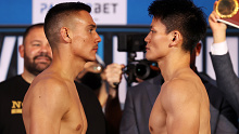 SYDNEY, AUSTRALIA - NOVEMBER 16: Tim Tszyu and Takeshi Inoue face off as they pose during the official Weigh In for the Tim Tszyu v Takeshi Inoue super welterweight bout on November 16, 2021 in Sydney, Australia. (Photo by Mark Kolbe/Getty Images)