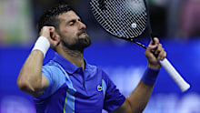Novak Djokovic celebrates after defeating Alexandre Muller in the first round of the US Open.