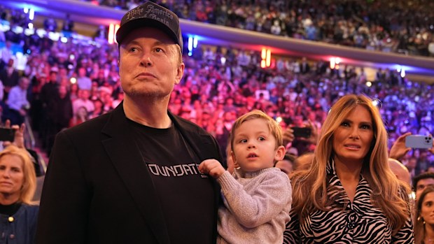 Elon Musk and former first lady Melania Trump listen as Republican presidential nominee former President Donald Trump speaks at a campaign rally at Madison Square Garden, Sunday, Oct. 27, 2024, in New York. 