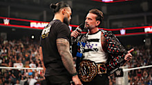 CM Punk and Roman Reigns square off ahead of WrestleMania 42.