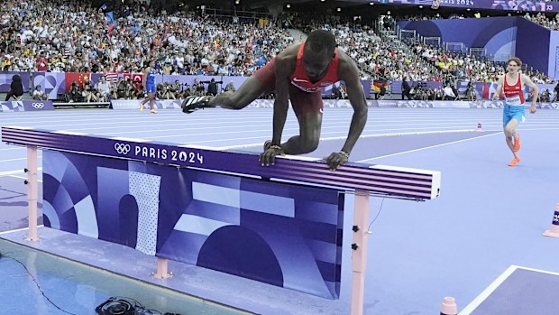 Amos Serem, of Kenya, competes during a heat in the men's 3000-metre steeplechase