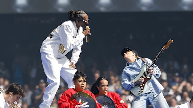 MELBOURNE, AUSTRALIA - SEPTEMBER 27: Snoop Dogg performs with Tash Sultana during the AFL Grand Final match between Geelong Cats and Brisbane Lions at Melbourne Cricket Ground on September 27, 2025 in Melbourne, Australia. (Photo by Darrian Traynor/Getty Images)