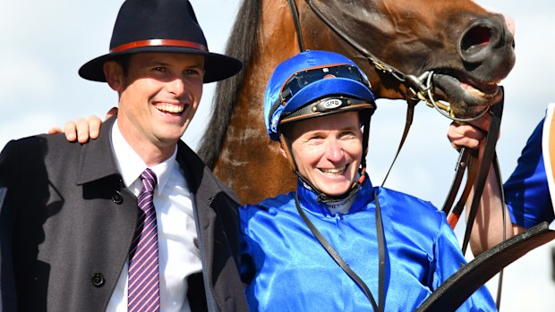 Trainer James Cummings and jockey James McDonald celebrate a Godolphin win.