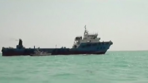 This undated image made from a video provided by the IRGC/IRIB shows a ship in the Persian Gulf. Iranian forces seized the ship, which it suspected of carrying smuggled fuel, state media reported Sunday, Aug. 4, 2019, marking the Revolutionary Guard's third seizure of a vessel in recent weeks and the latest show of strength by the paramilitary force amid a spike in regional tensions. 