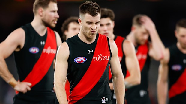 Zach Merrett of the Bombers looks dejected after their round 23 loss to Sydney.