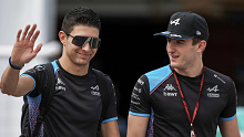 Esteban Ocon and Jack Doohan of Alpine F1 arrive at the track during practice ahead of the F1 Grand Prix of Japan at Suzuka Circuit in 2023.