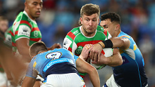 Jai Arrow of the Rabbitohs is tackled during the round 14 match between Gold Coast Titans and South Sydney at Cbus Super Stadium on June 03, 2023 in Gold Coast, Australia. 