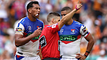 Referee Peter Gough sends off Jacob Saifiti following a high tackle on Jack Simpkin. 