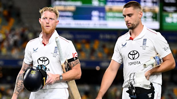 BRISBANE, AUSTRALIA - DECEMBER 06: England captain Ben Stokes and Will Jacks leave the field at stumps on day three of the Second 2025/26 Ashes Series Test Match between Australia and England at The Gabba on December 06, 2025 in Brisbane, Australia. (Photo by Gareth Copley/Getty Images)