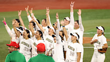 Mexico celebrates after defeating Australia 4-1 at Yokohama Baseball Stadium.