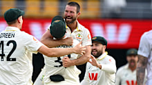BRISBANE, AUSTRALIA - DECEMBER 07: Michael Neser of Australia celebrates with team mates after taking the wicket of Ben Stokes of England during day four of the Second 2025/26 Ashes Series Test Match between Australia and England at The Gabba on December 07, 2025 in Brisbane, Australia. (Photo by Bradley Kanaris - CA/Cricket Australia via Getty Images)
