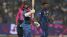 Afghanistan's captain Hashimatullah Shahidi celebrates his 50 runs against Sri Lanka.